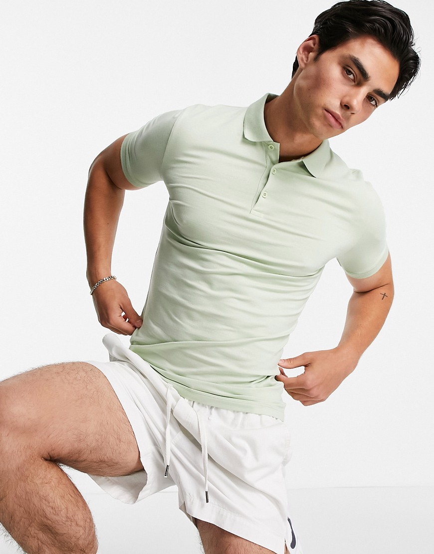 ASOS DESIGN cotton blend muscle fit jersey polo in light green