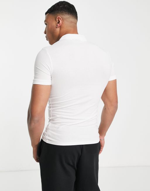 ASOS DESIGN cotton blend muscle fit polo in white | ASOS