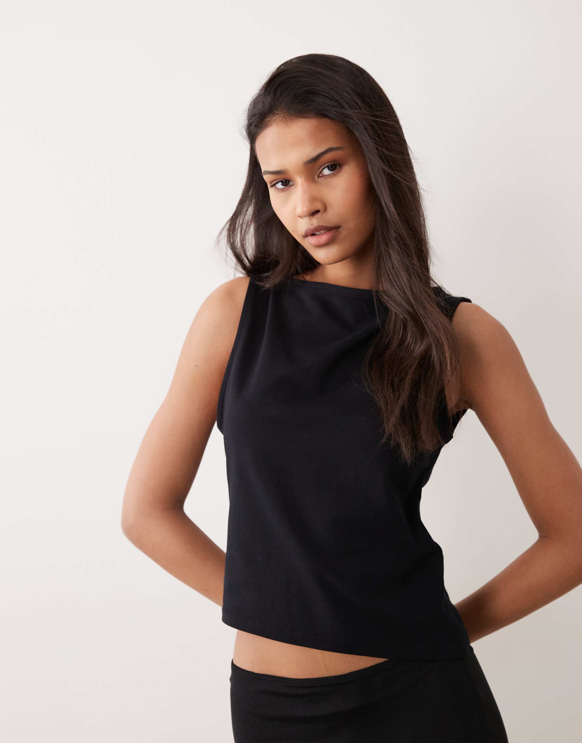 asos design cotton blend sleeveless boat neck tank top with asymmetric hem in black