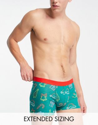 ASOS DESIGN cotton blend trunks in green with christmas print