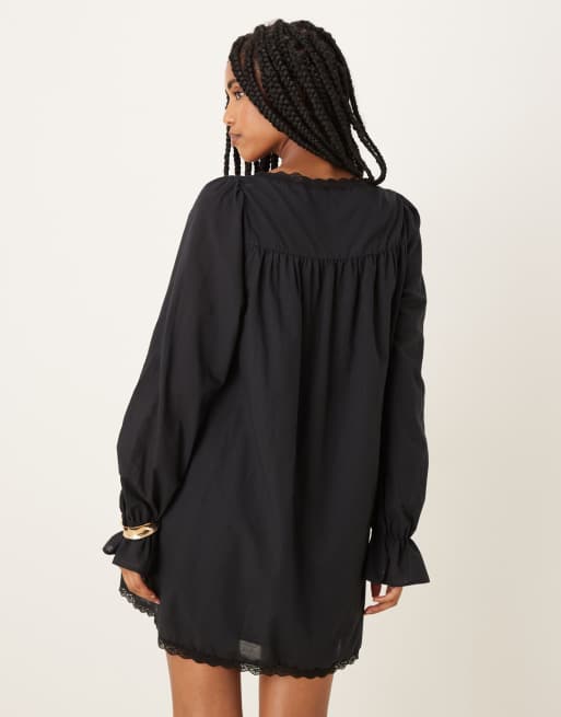 ASOS DESIGN cotton lace trim long sleeve babydoll mini dress in black