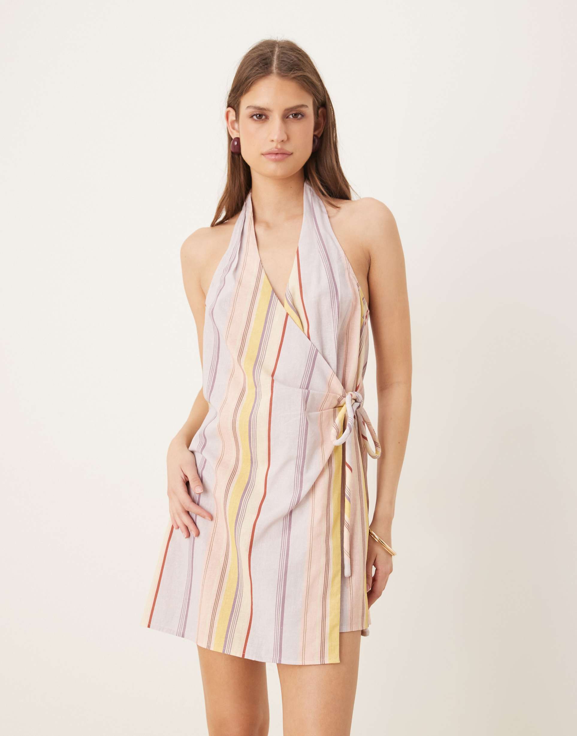 asos design cotton linen blend halter neck wrap mini sundress in pastel mixed stripes