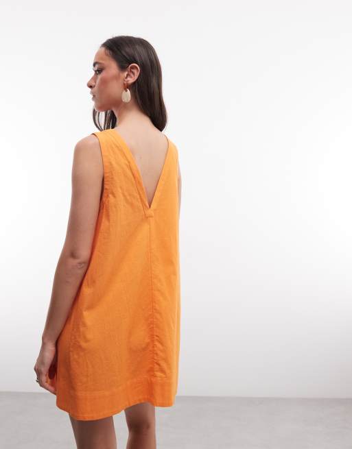ASOS DESIGN cotton linen look v neck smock midi dress in orange, 2 of 4