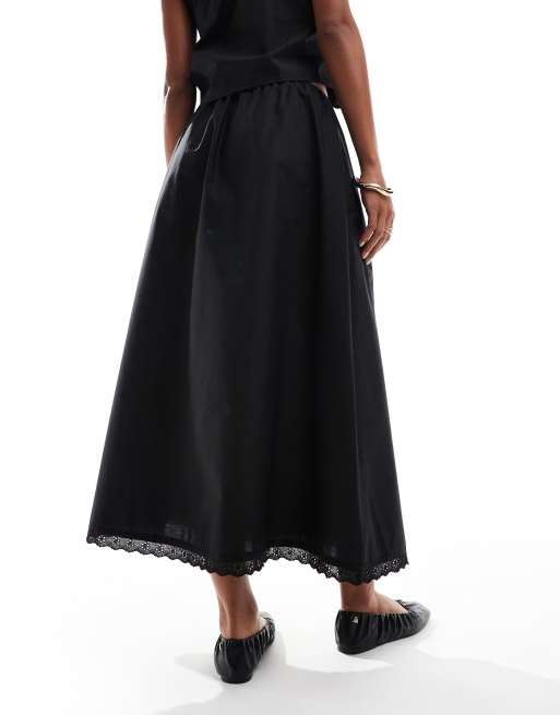 ASOS DESIGN cotton look drawstring waist maxi skirt with eyelet trim in black part of a set