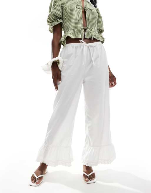 ASOS DESIGN cotton look frill hem lace trim pants in white