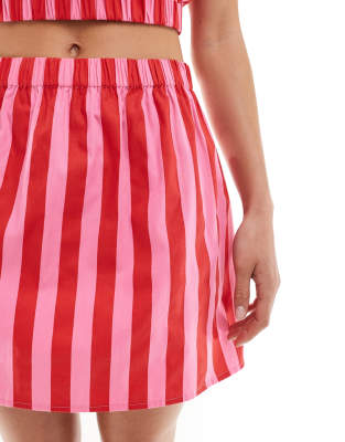 ASOS DESIGN cotton mini skirt in pink and red stripe part of a