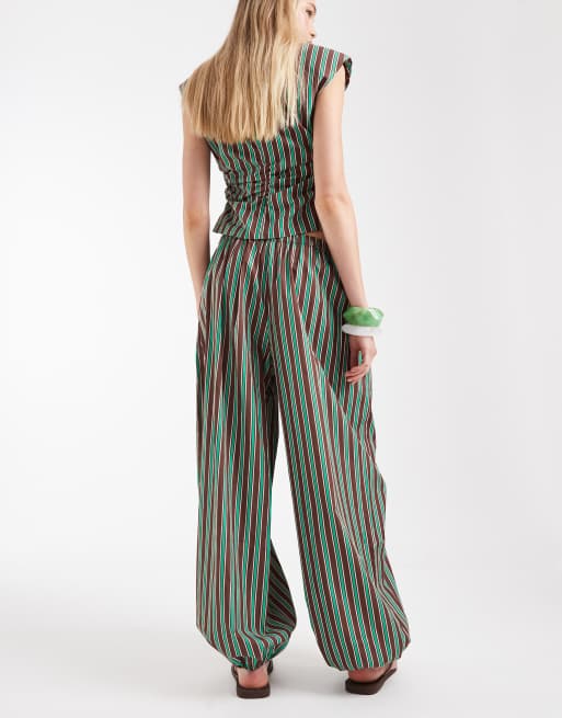 ASOS DESIGN cotton nylon blend pull on balloon pants in green and chocolate stripes, 4 of 7