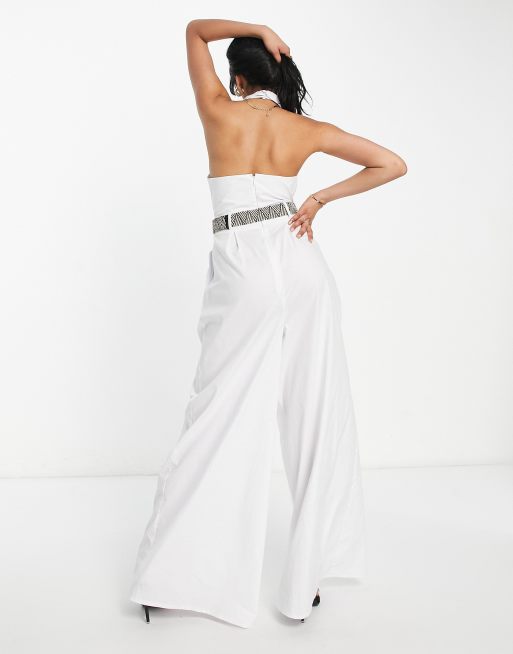 ASOS DESIGN textured halter jumpsuit with belt and large pocket in