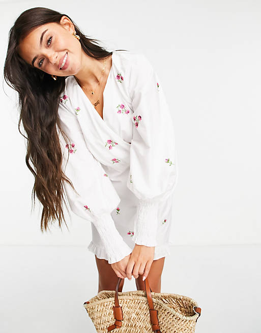 ASOS DESIGN cotton poplin wrap front mini dress with all over embroidery in white