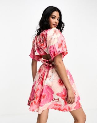 ASOS DESIGN cotton puff sleeve mini dress with cut out back in oversized bloom print