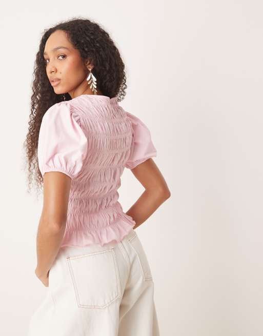 ASOS DESIGN cotton shirred top with frill peplum and puff sleeve in baby  pink - Main Image