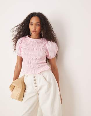 Asos Design Cotton Shirred Top With Ruffle Peplum And Puff Sleeves In Pink