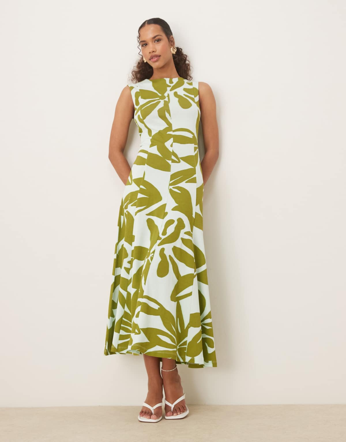 ASOS Design cotton sleeveless midi sundress in green oversized floral print