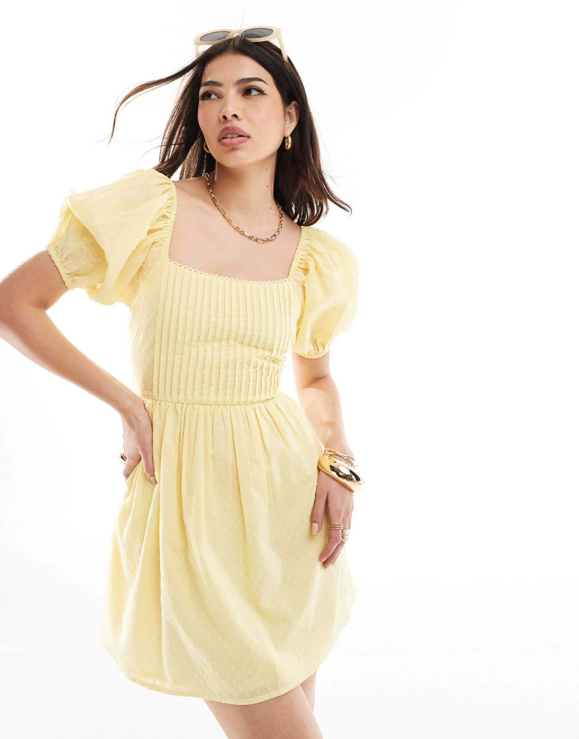 asos design cotton textured mini dress with lace up back in yellow