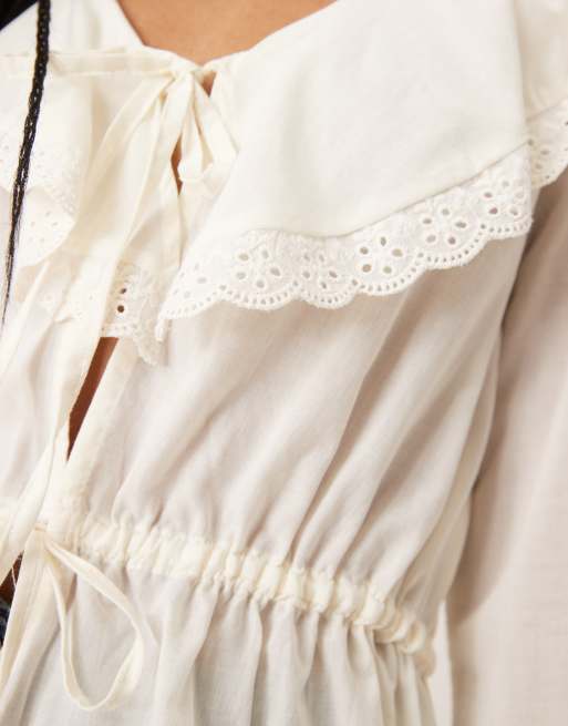 ASOS DESIGN cotton tie front ruffle boho blouse in ivory