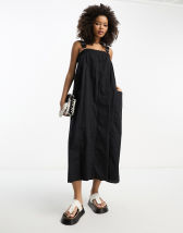 ASOS DESIGN Curve cotton trapeze dungaree sundress in black | ASOS