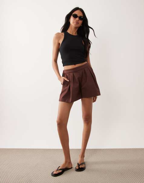 ASOS DESIGN cotton twill pleated shorts in chocolate - view 1