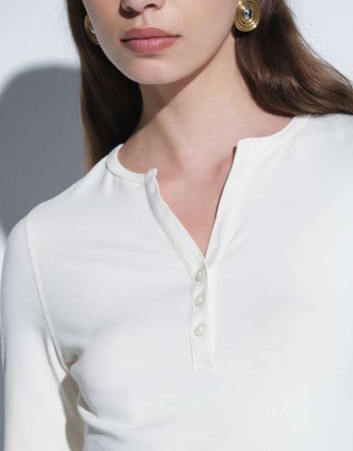 ASOS DESIGN cotton V neck button detail henley long sleeve baby tee in cream, 3 of 4