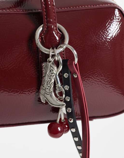 ASOS DESIGN cowboy boot and cherry charm carabiner jeans clip in red, 3 of 3