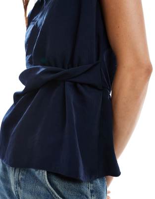 ASOS DESIGN cowl neck sleeveless top with twist waist detail in dark navy