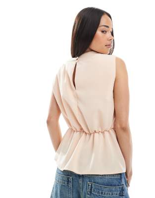 ASOS DESIGN cowl neck sleeveless top with twist waist detail in peach