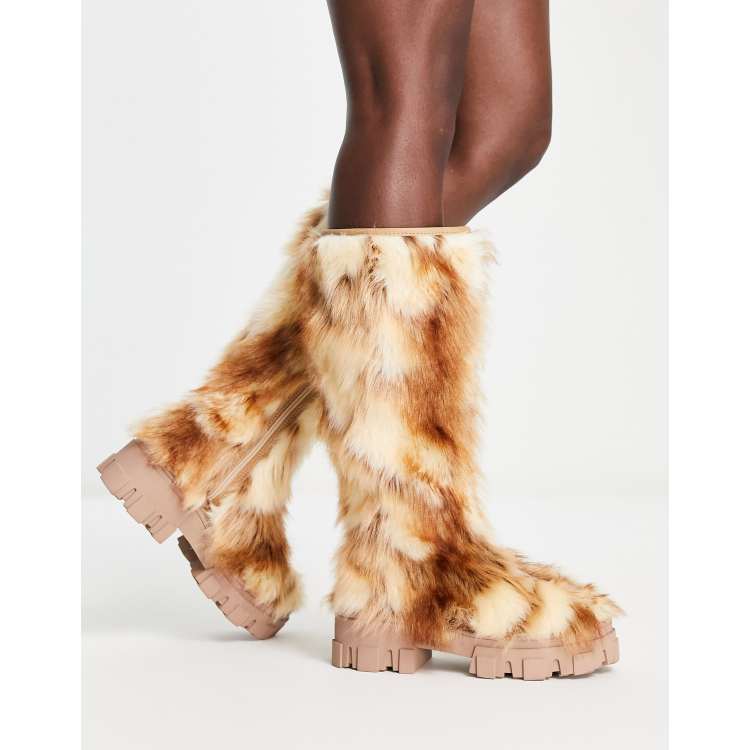 Thigh high best sale fuzzy boots