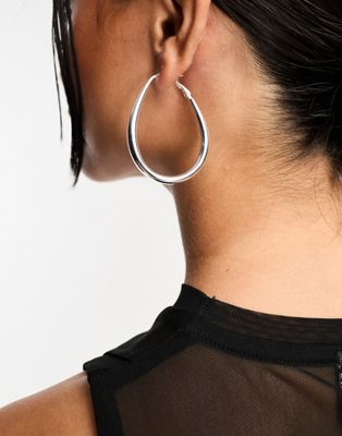 ASOS DESIGN silver plated hoop earrings in slim oval design - ASOS Price Checker