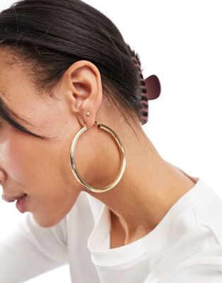 ASOS DESIGN 70mm hoop earrings in simple tube design in gold tone - ASOS Price Checker