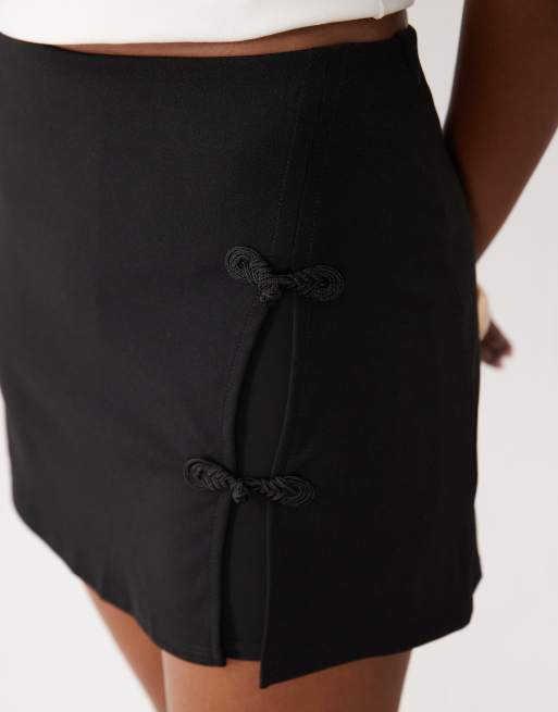 ASOS DESIGN crepe a-line mini skort with rouleau loops in black scuba-style fabric, 4 of 5