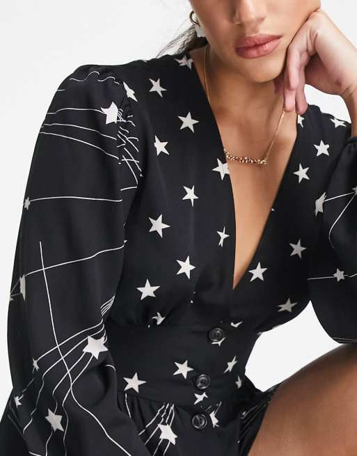 ASOS DESIGN crepe plunge neck playsuit with puff sleeve in mixed star print