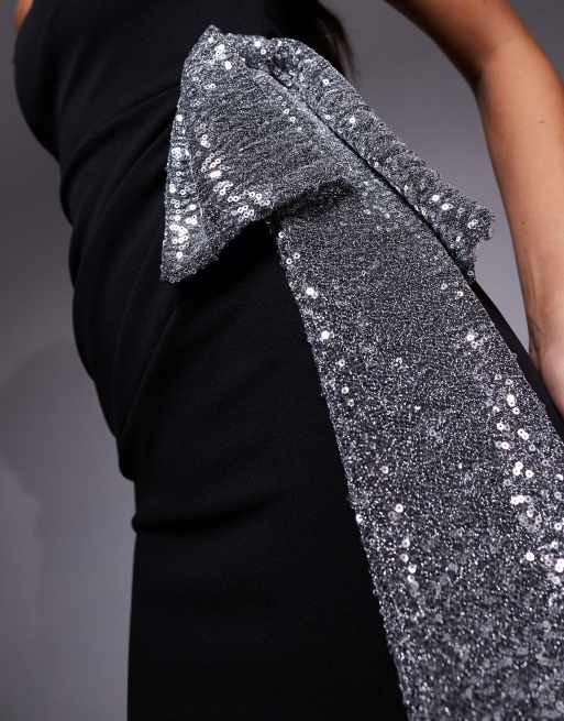 ASOS DESIGN crepe twisted off the shoulder mini dress with silver sequined bow side detail in black