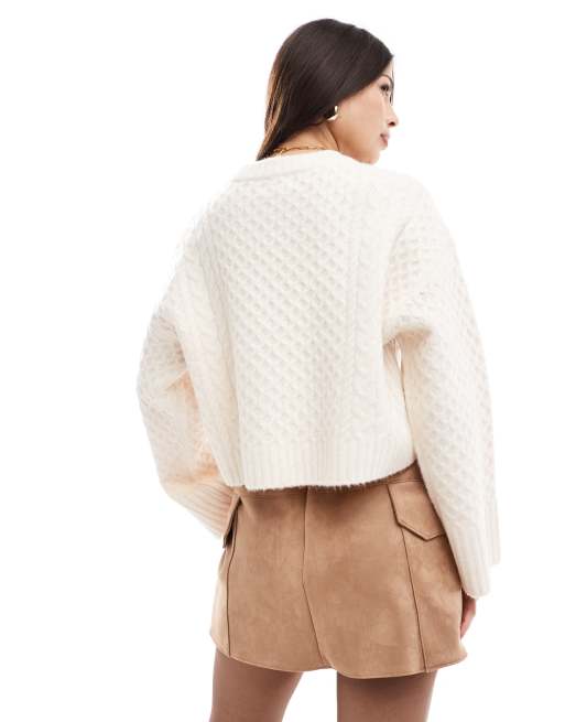 ASOS DESIGN crew neck boxy sweater with wide cuff in cable knit in cream