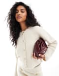 ASOS DESIGN crew neck cardigan in boucle yarn in cream-White