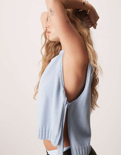 ASOS DESIGN crew neck knit tabard vest with tie sides in light blue