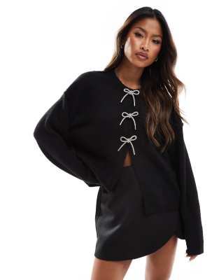 crew neck oversized cardigan with diamante bow buttons in black