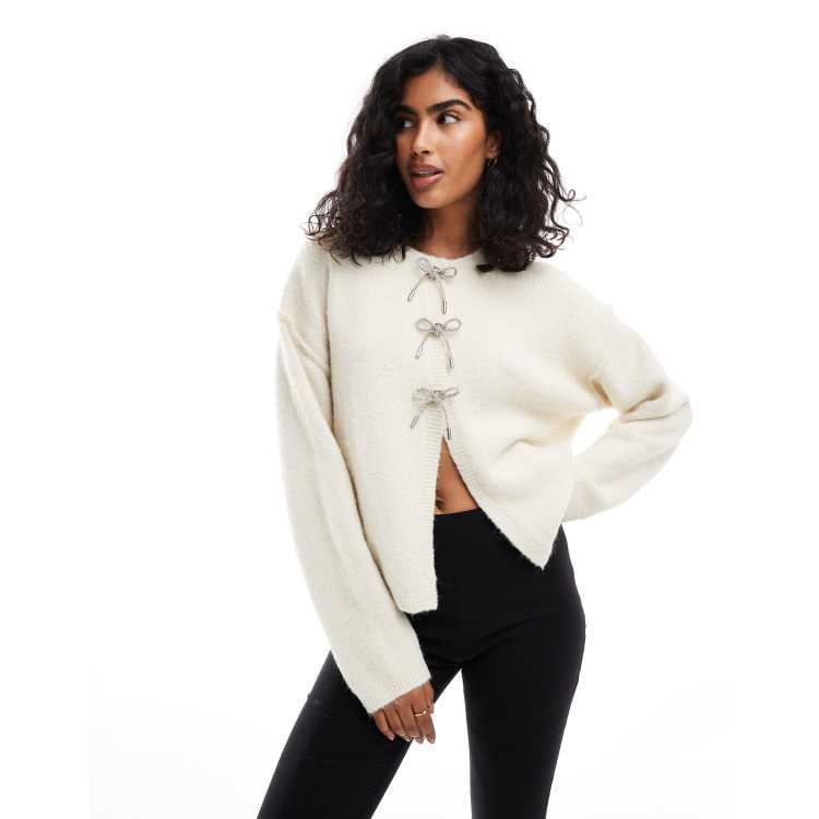 ASOS DESIGN crew neck oversized cardigan with diamante bow buttons