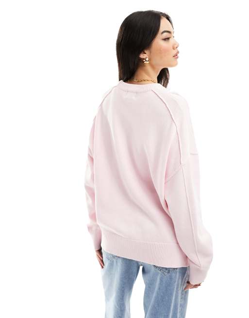 ASOS DESIGN oversized sweater with loose textured stitch in pink