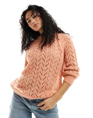 crew neck sweater in loose pointelle stitch in apricot-Orange