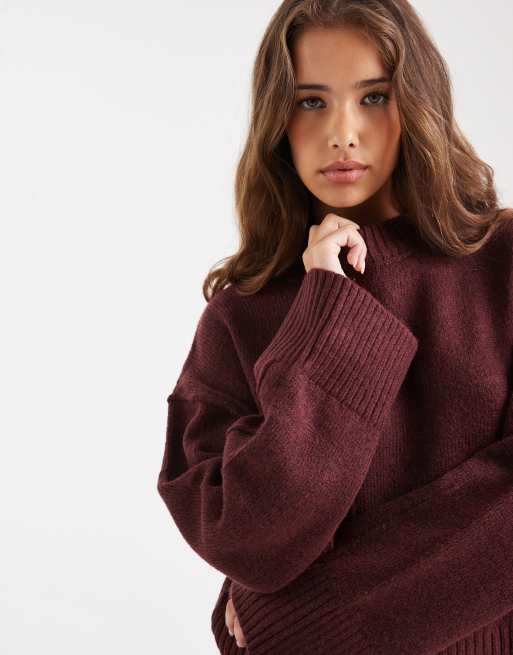 ASOS DESIGN crew neck sweater with seam front detail and stepped hem in plum