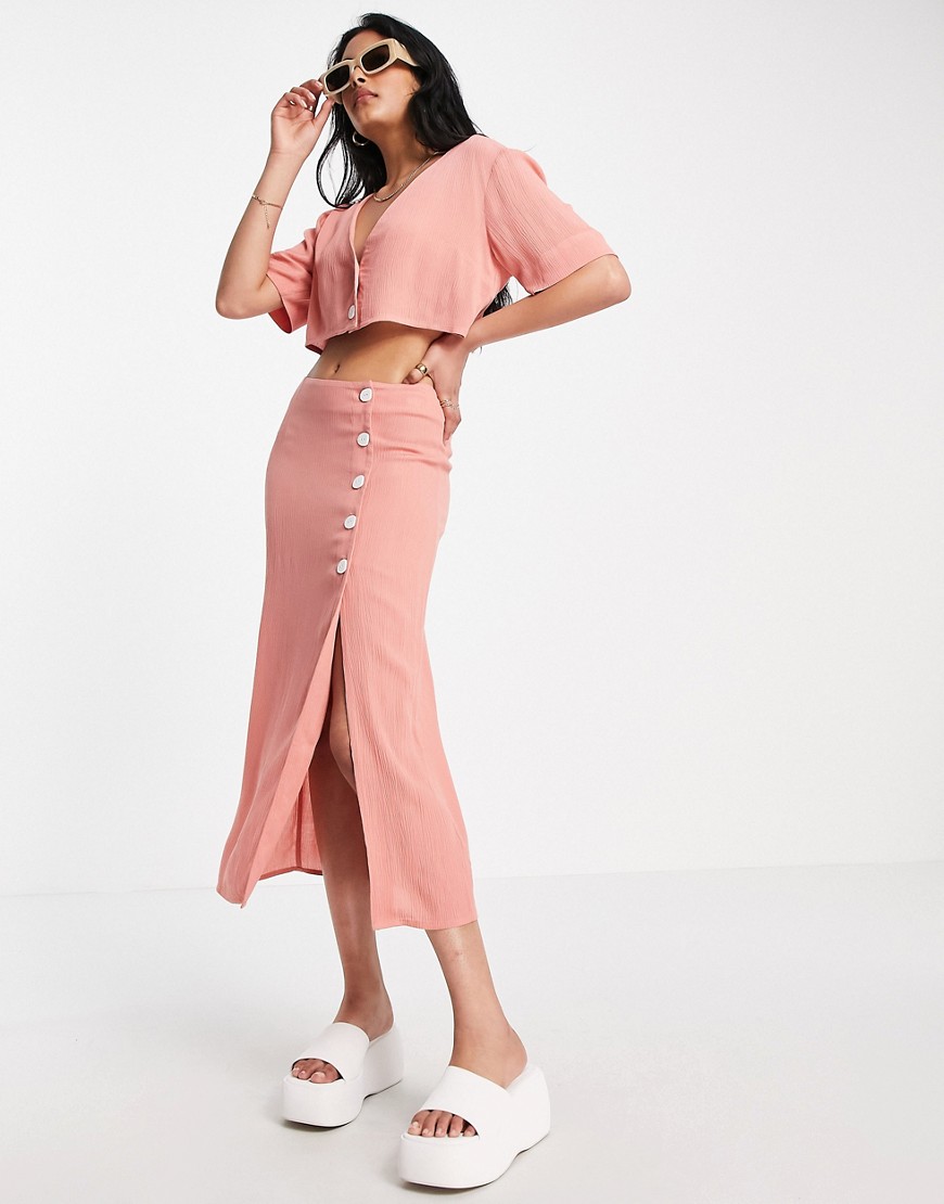 ASOS DESIGN crinkle button side midi skirt co-ord in pink