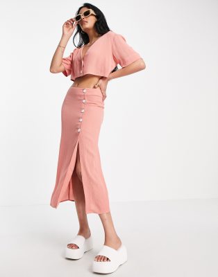 ASOS DESIGN crinkle button side midi skirt in pink - part of a set