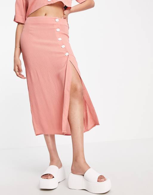 ASOS DESIGN crinkle button side midi skirt in pink part of a set