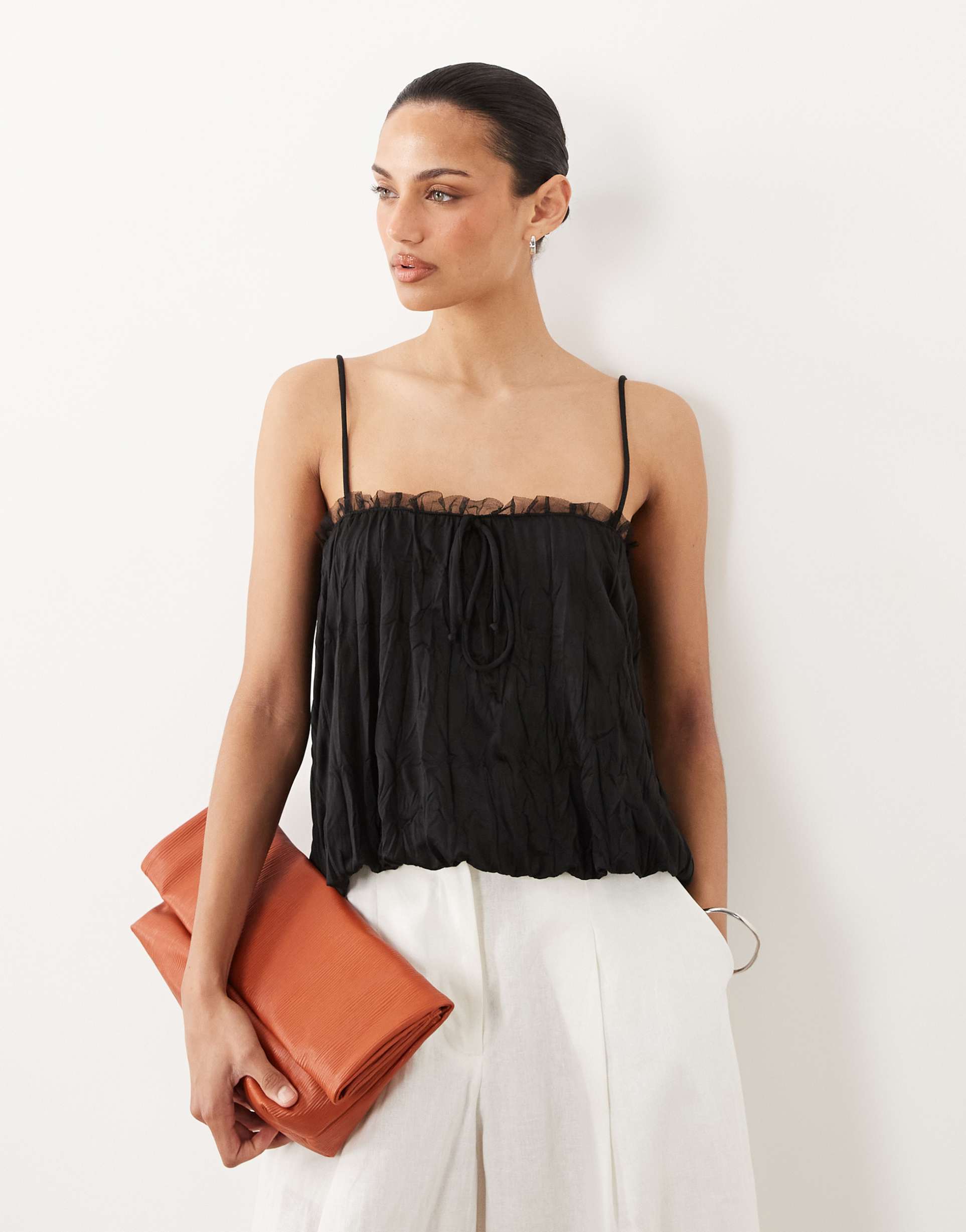 asos design crinkle cami top with bubble hem and mesh trim in black