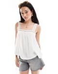 [ASOS DESIGN] ASOS DESIGN crinkle cami top with lace insert detail and tie back in white-Black 4 black