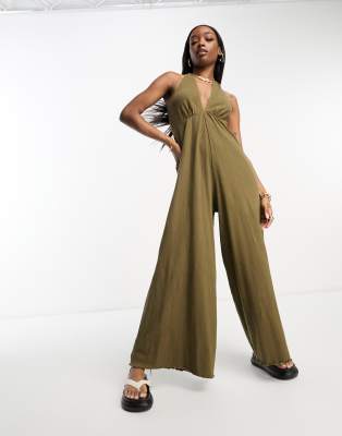 ASOS DESIGN crinkle jersey halter jumpsuit in olive - ASOS Price Checker