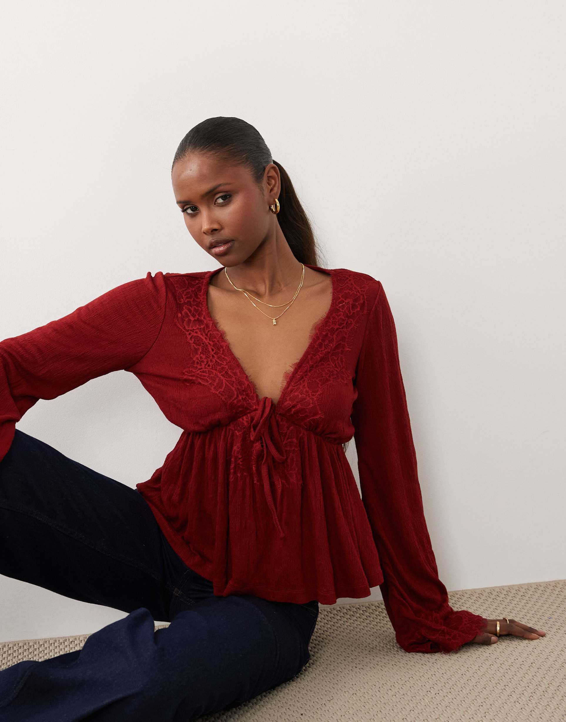 asos design crinkle lace trim plunge neck top with flare sleeves in red