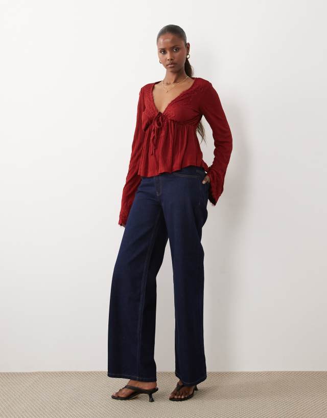 ASOS DESIGN crinkle lace trim plunge neck top with flare sleeves