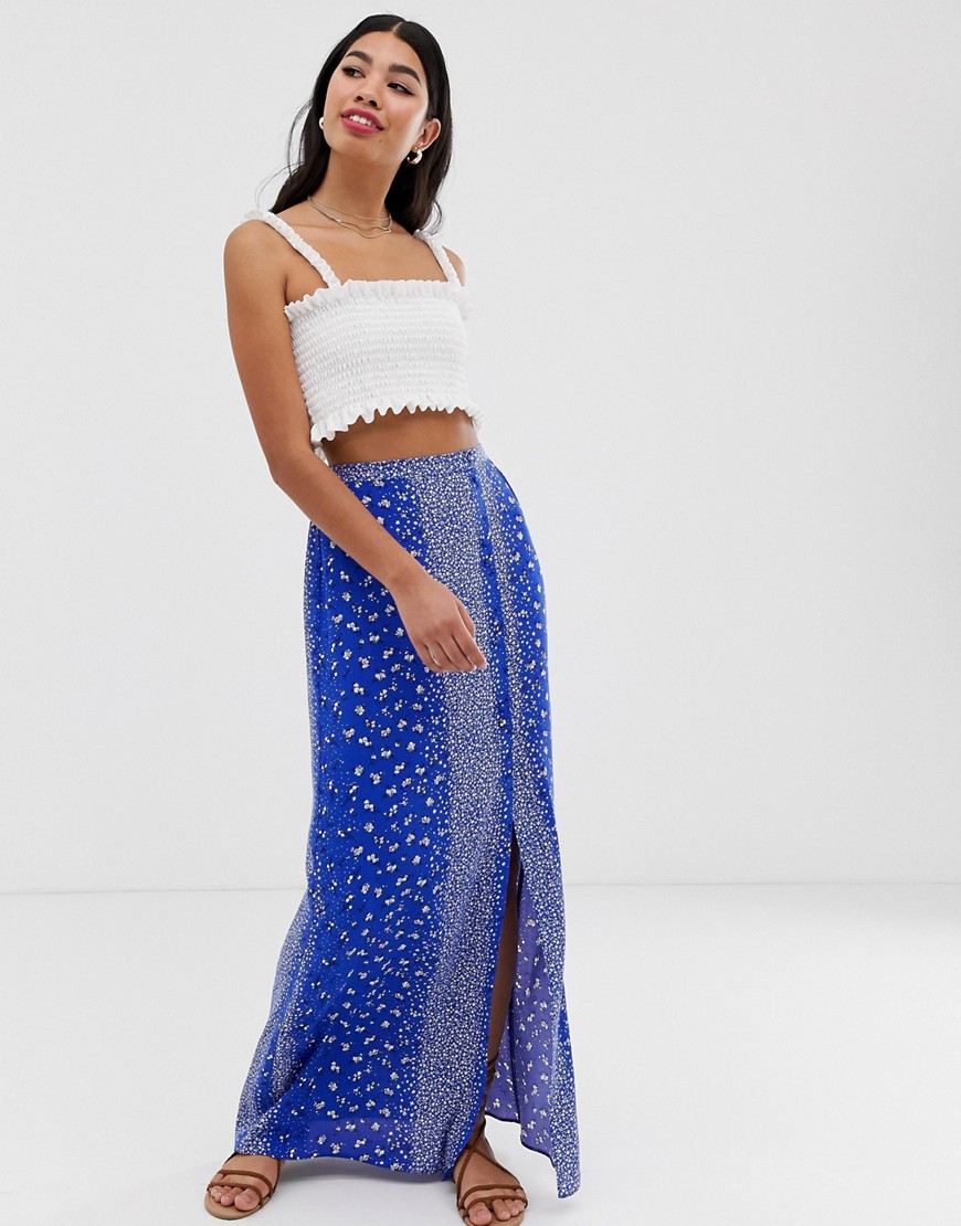 ASOS DESIGN crinkle maxi skirt with self covered buttons in blue floral print-Multi