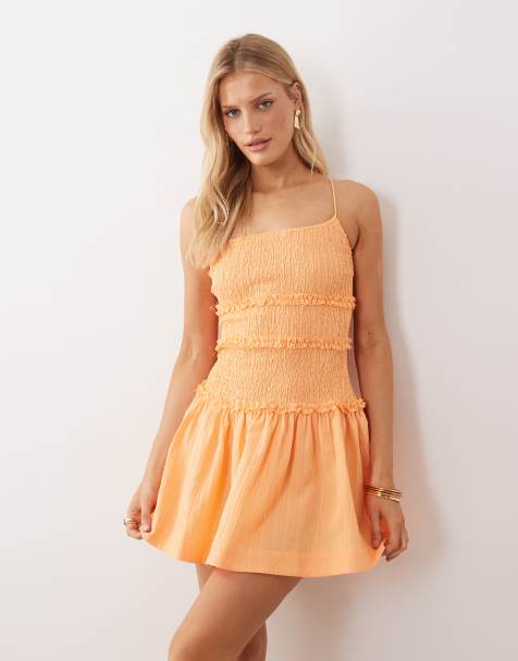 ASOS DESIGN crinkle mini sundress with shirred dropped waist in orange spritz - view 1