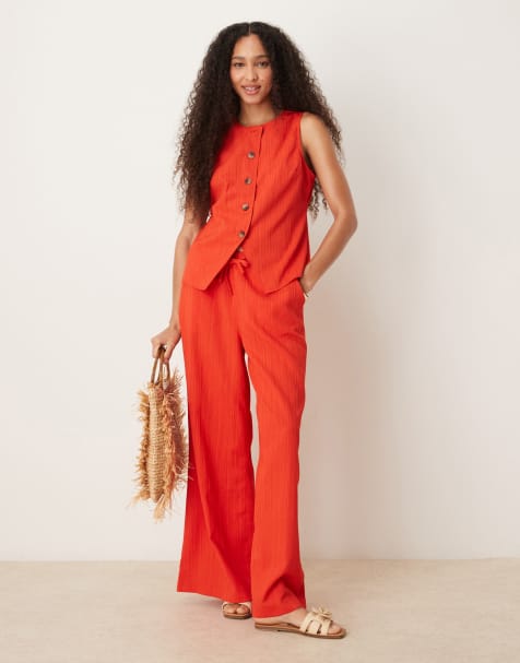 ASOS DESIGN crinkle palazzo trousers co-ord in orange - view 1